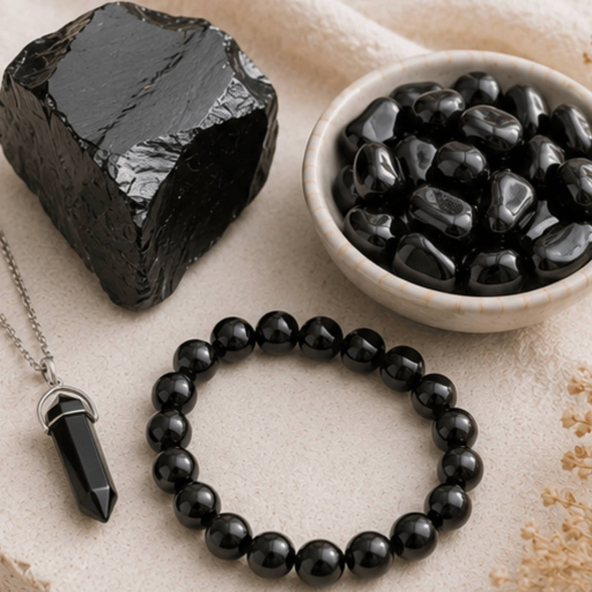 Black obsidian crystal jewelry collection with volcanic protective stone. Black Obsidian necklaces, bracelets, earrings, and more
