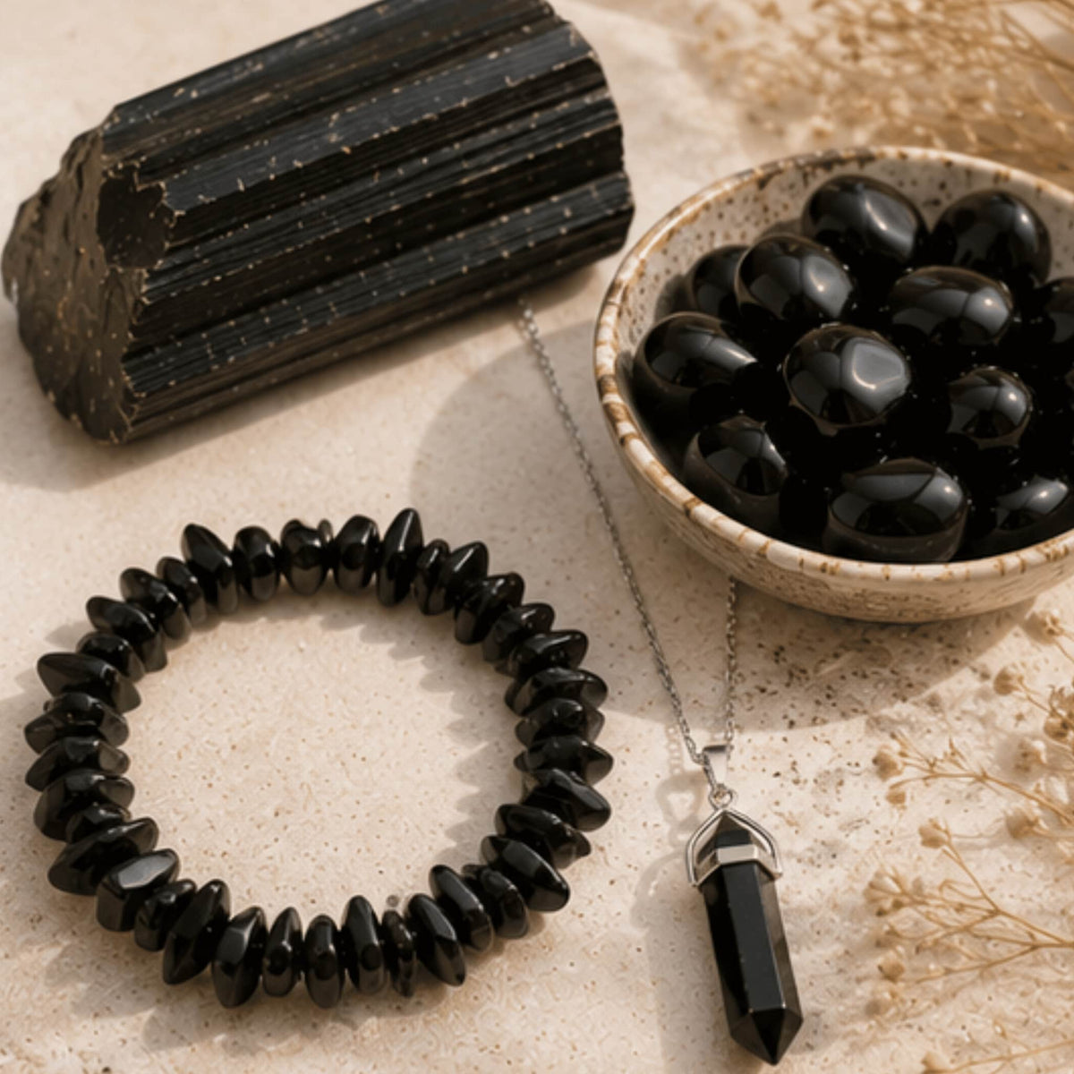Black tourmaline crystal jewelry collection with protective healing stone. Black Tourmaline necklaces, pendants, bracelets and rings
