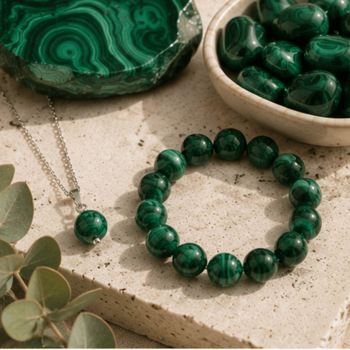 Malachite crystal jewelry collection with green transformative healing stone. Malachite bracelets, necklaces and more