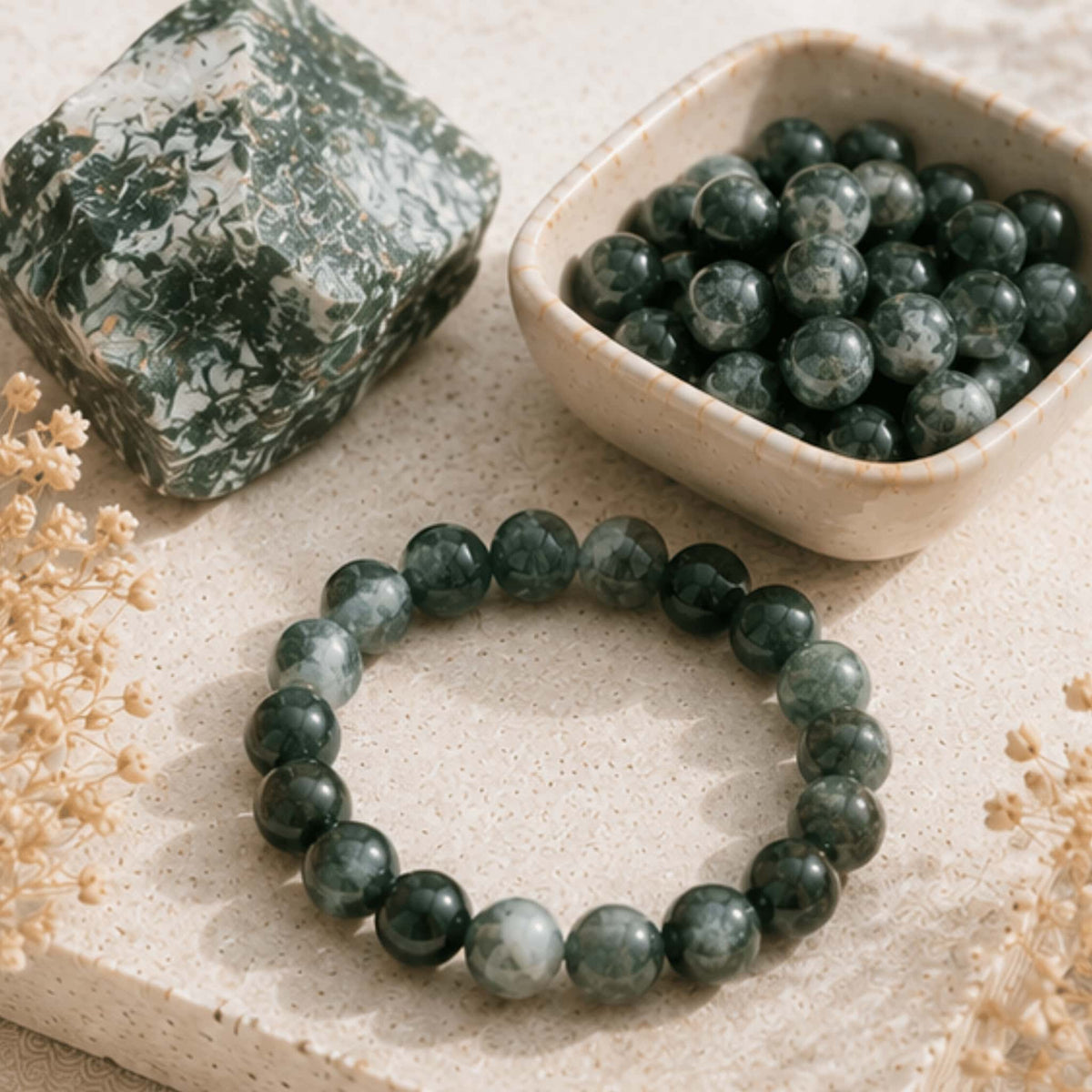 Moss agate crystal jewelry collection with green nature healing stone. Moss agate bracelets, necklaces, earrings, rings, and more