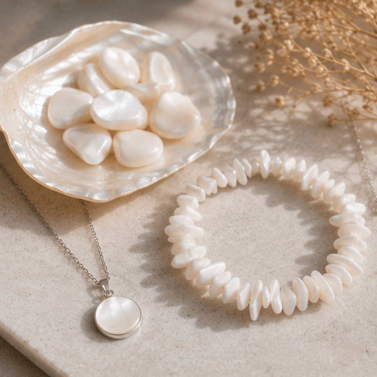 Mother of pearl crystal jewelry collection with iridescent healing shell stone. Mother of pearl bracelets, earrings and more