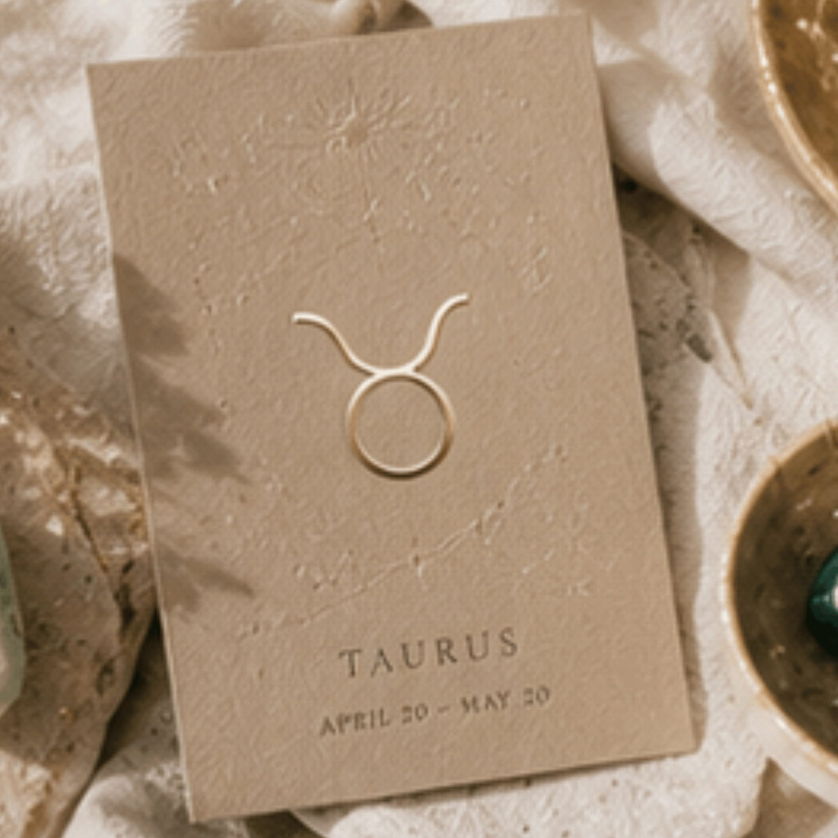 Taurus zodiac crystal jewelry collection with Taurus gemstones, Taurus pendants and Taurus clothing