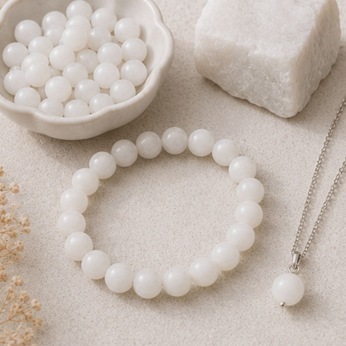 White jade crystal jewelry collection with pure protective healing stone. White Jade bracelets, necklaces and more