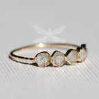 Blue-white shimmer in a 14K gold moonstone ring