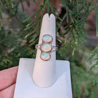 Three-stone opal ring with organic hand-finished settings