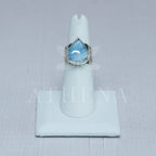 Side view of the Sky blue opal ring’s wide band