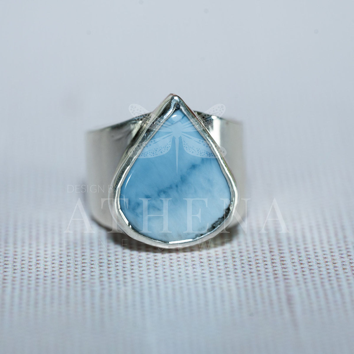 Light blue opal set in a bold sterling silver ring
