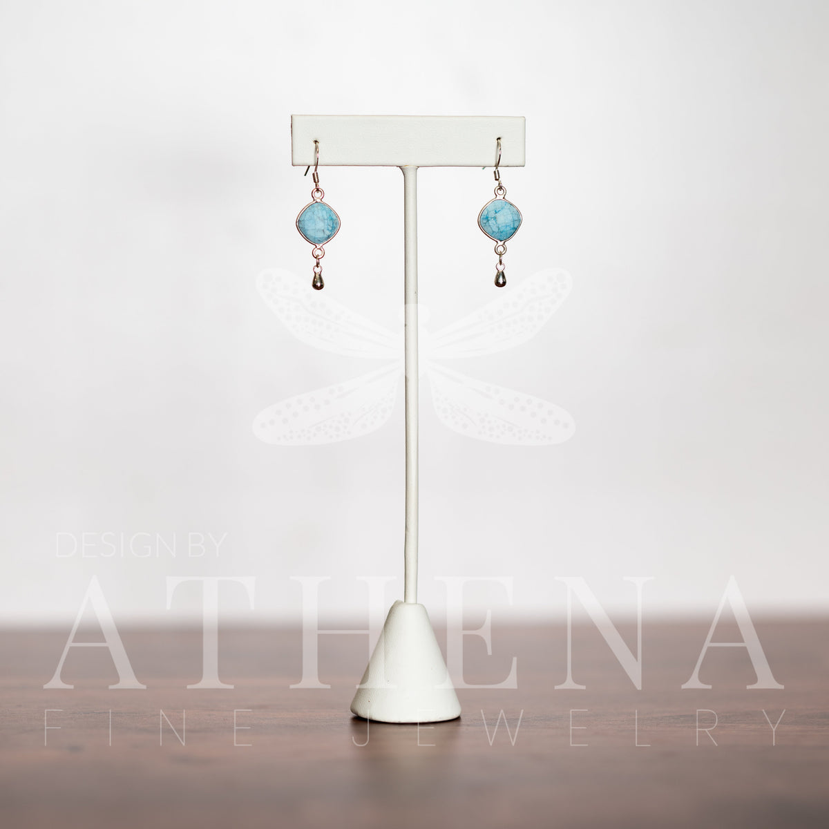 Unpolished turquoise stones in sterling silver earrings