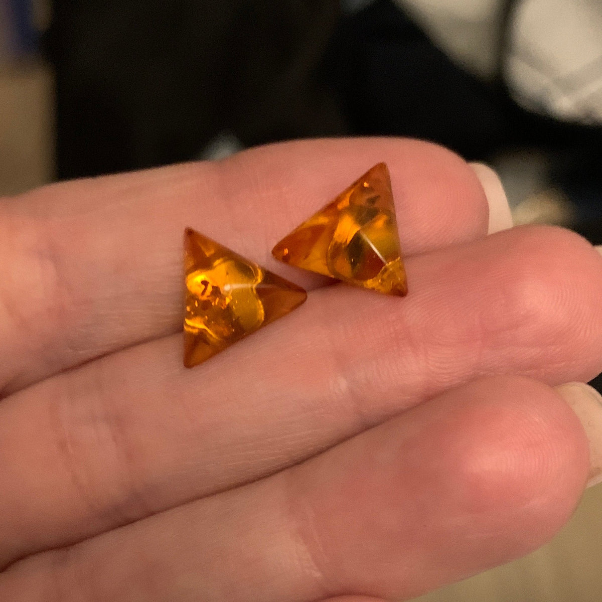Lightweight geometric amber earrings with natural inclusions
