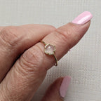 Moonstone gemstone ring with diamond accents in yellow gold