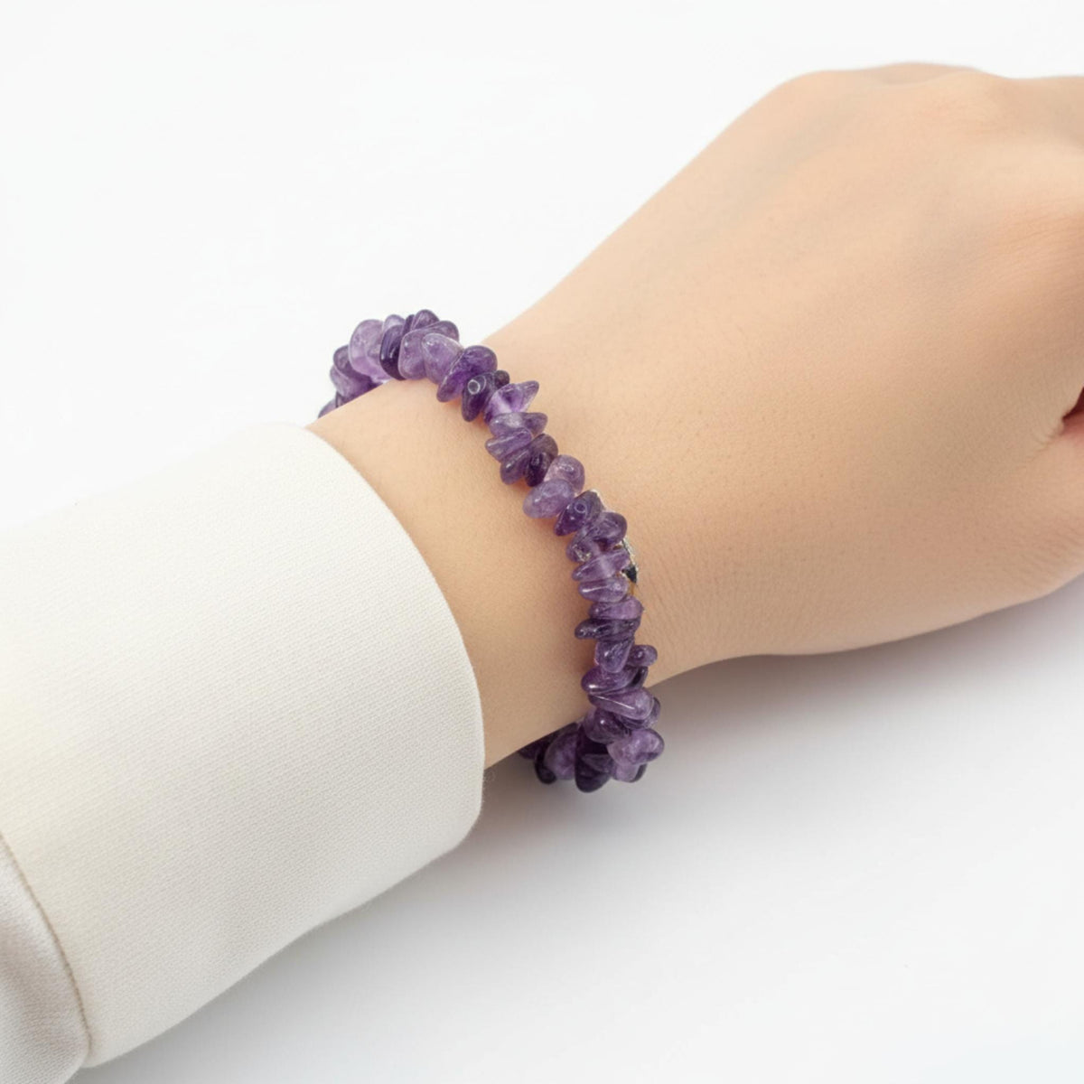 Amethyst crystal bracelet on wrist – crown chakra healing bracelet for calm, anxiety relief and sleep