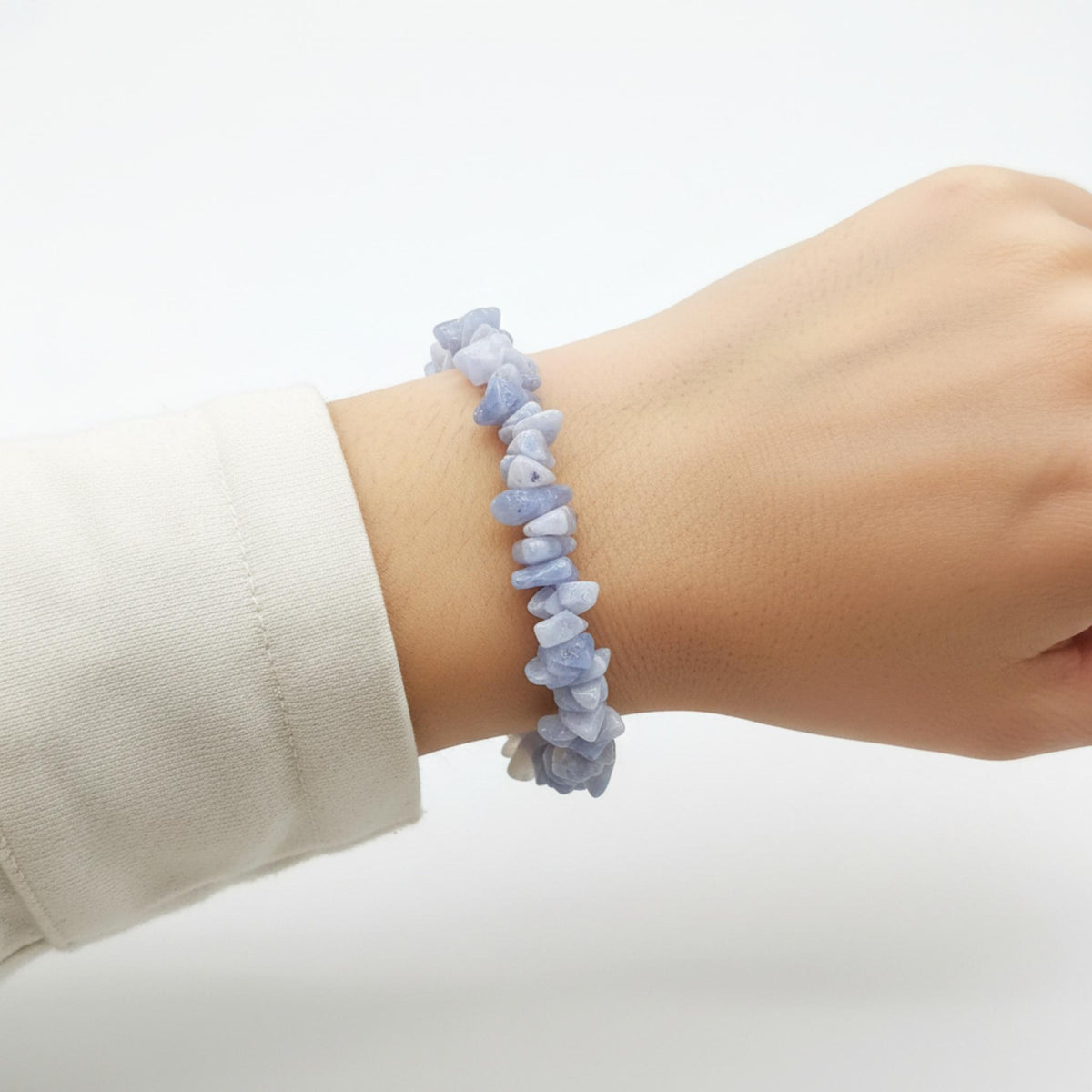 Blue Lace Agate healing bracelet on wrist – crystal bracelet for anxiety, communication and self-expression