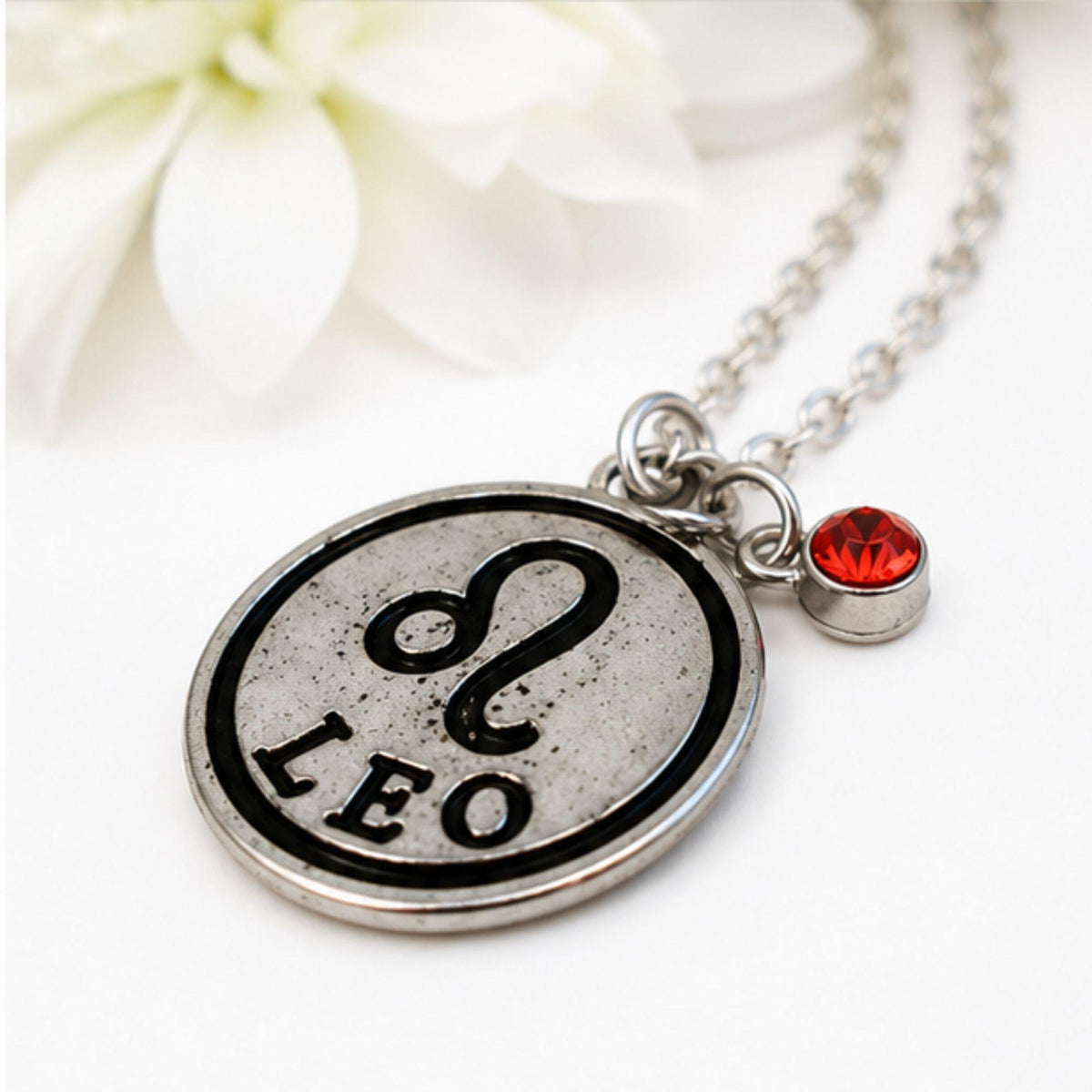 Leo zodiac necklace with birthstone charm