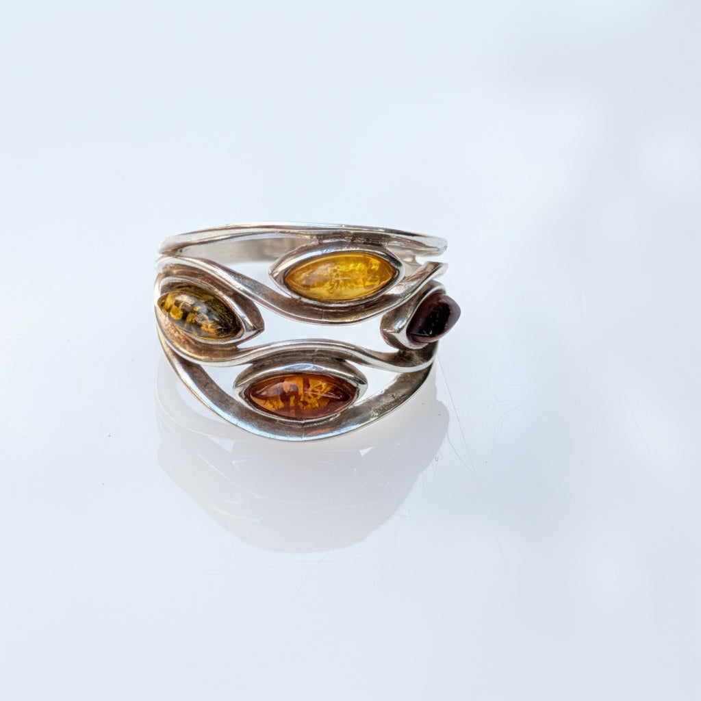 Baltic amber ring in sterling silver with three marquise-cut stones