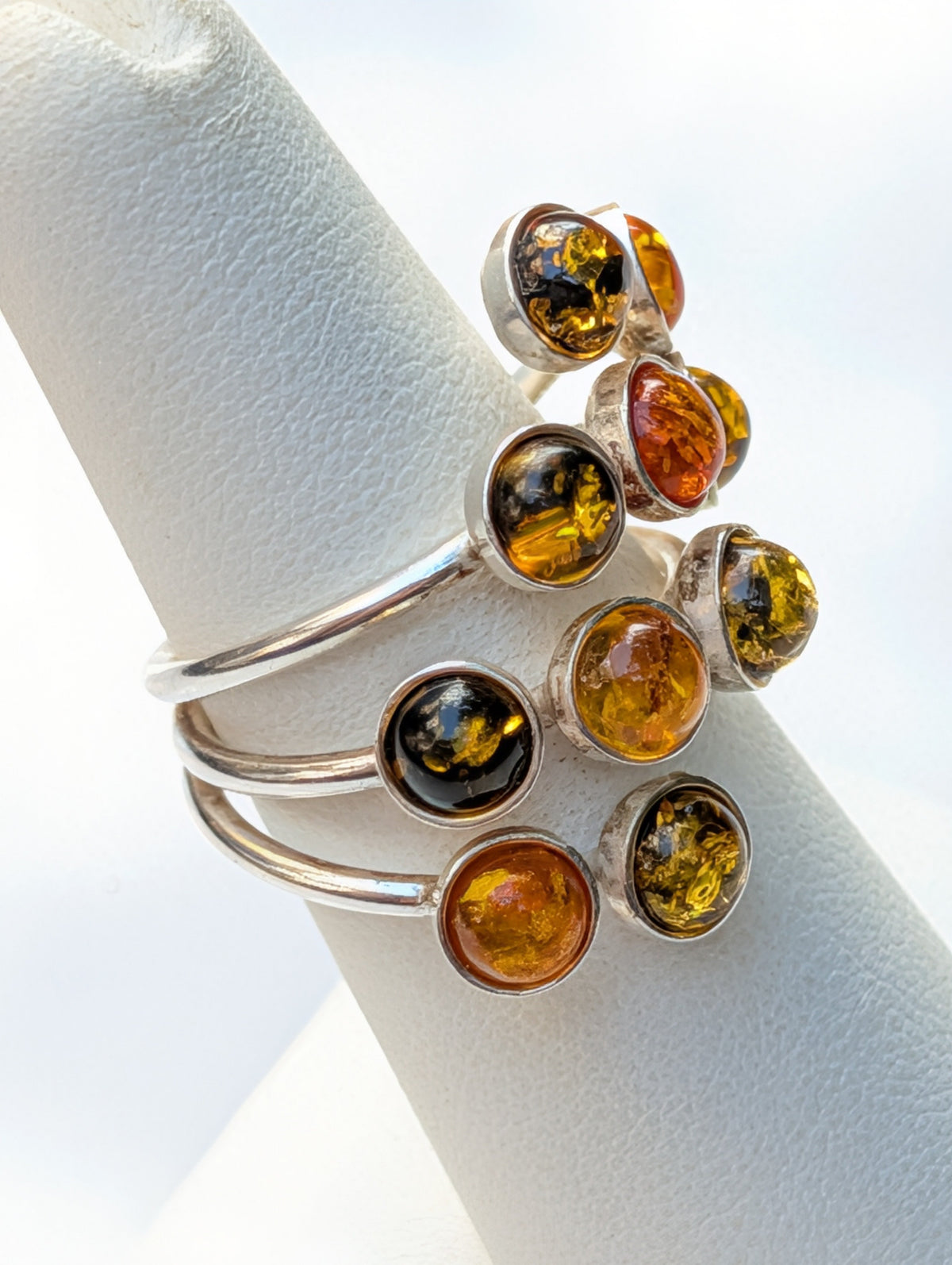 Baltic amber cocktail ring with a balanced silver band