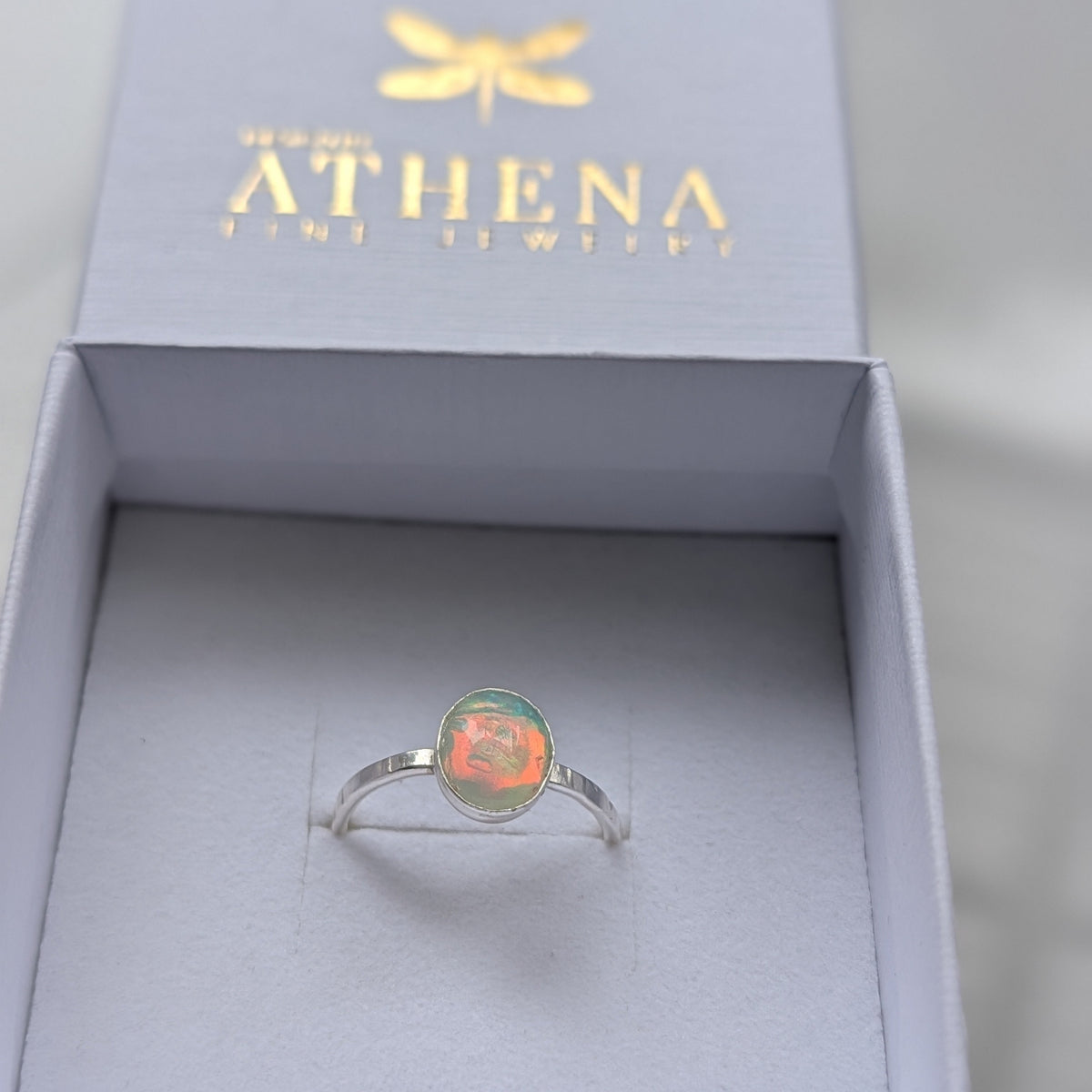 DesignbyAthena fire opal ring in a sterling silver setting