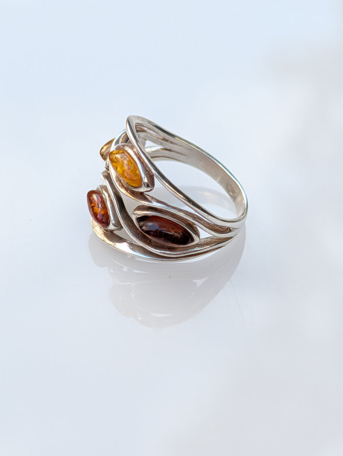 Marquise-cut Baltic amber stones set in a sculptural silver ring