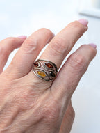 Sterling silver statement ring with three marquise Baltic amber stones