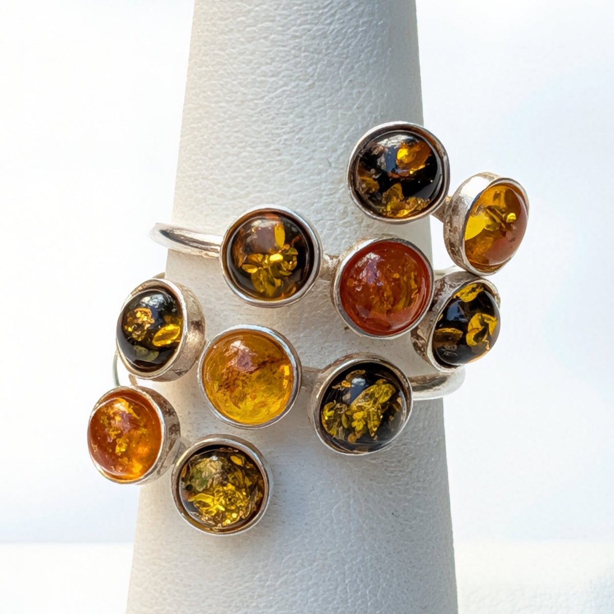 Amber Garden ring showing its sculptural silver setting