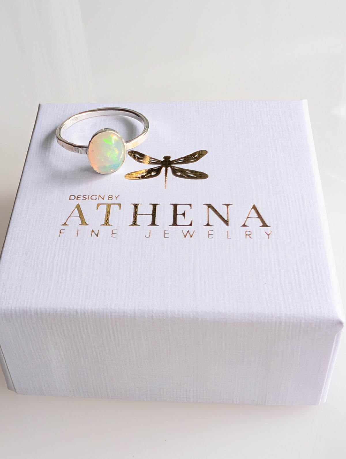 Handcrafted bezel-set fire opal ring in sterling silver