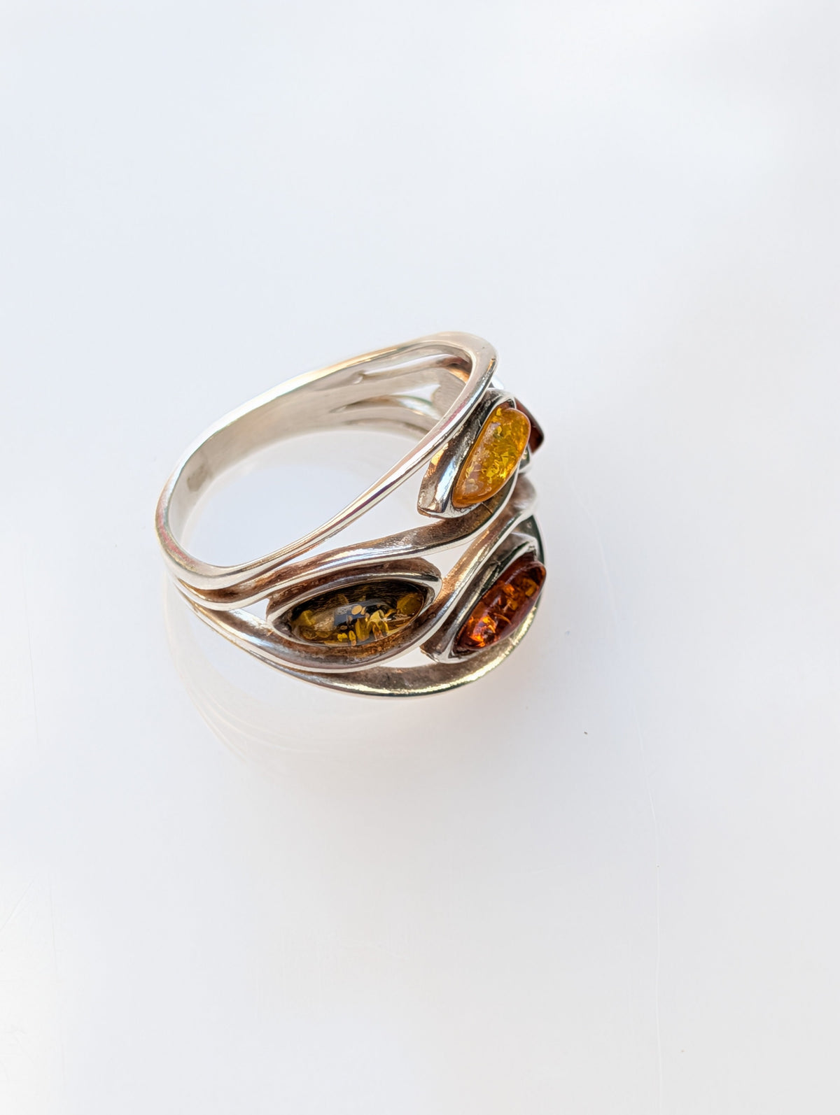Amber Current ring with three honey-toned Baltic amber stones