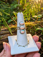Three Ethiopian opals set in a sterling silver ring