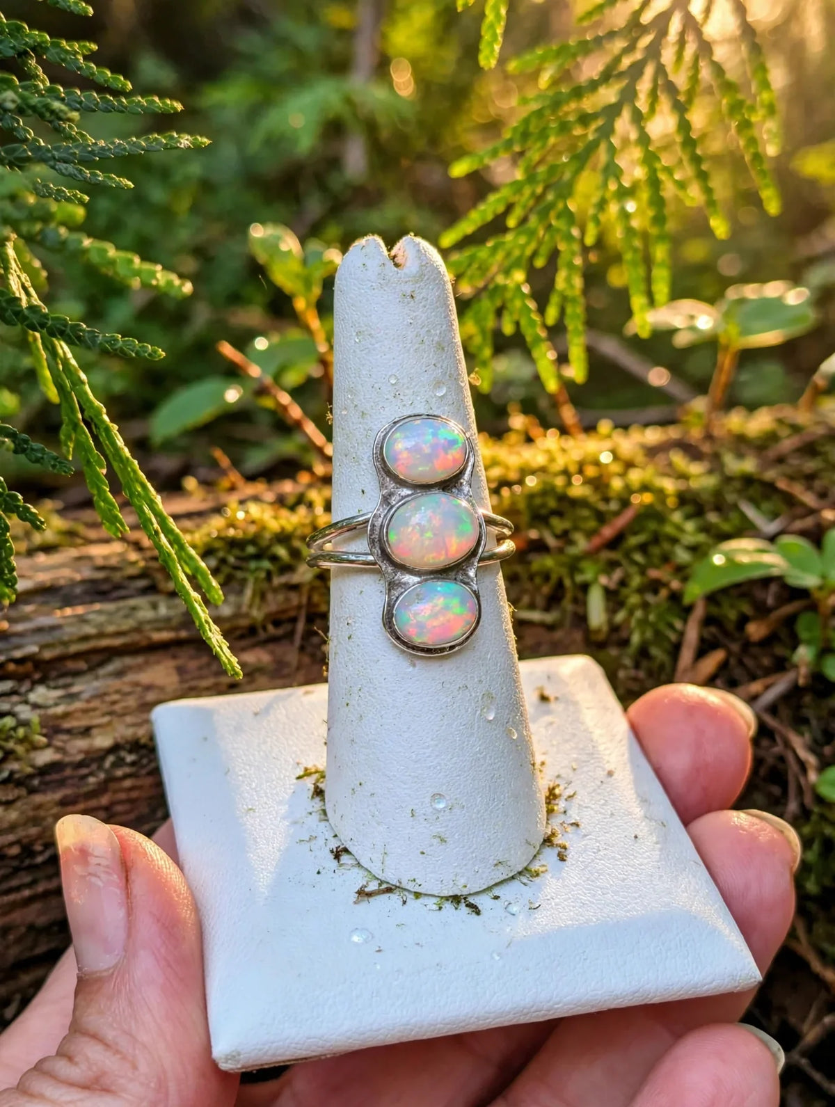 Three Ethiopian opals set in a sterling silver ring