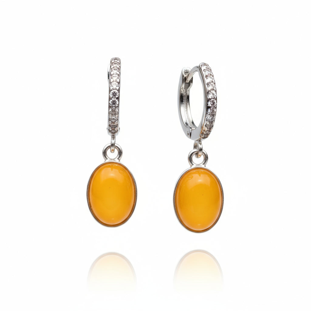 Baltic amber drop earrings in sterling silver with oval butterscotch stones